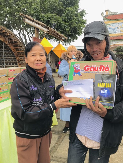Year End Practice, a past year closing program, giving Tet gifts at Dong Cao pagoda