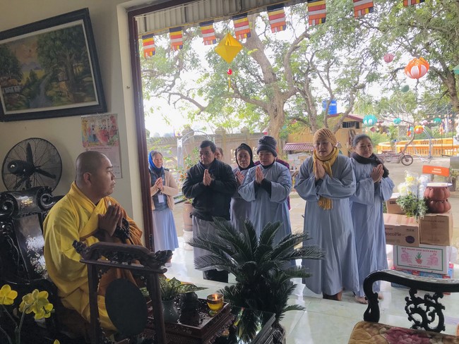 Year End Practice, a past year closing program, giving Tet gifts at Dong Cao pagoda