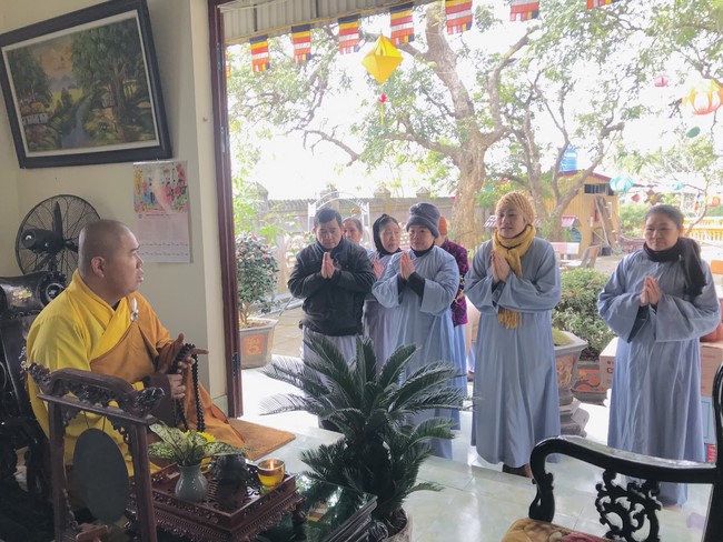 Year End Practice, a past year closing program, giving Tet gifts at Dong Cao pagoda