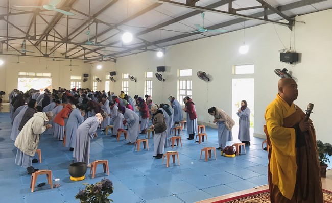 Year End Practice, a past year closing program, giving Tet gifts at Dong Cao pagoda