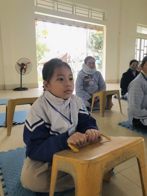 Year End Practice, a past year closing program, giving Tet gifts at Dong Cao pagoda
