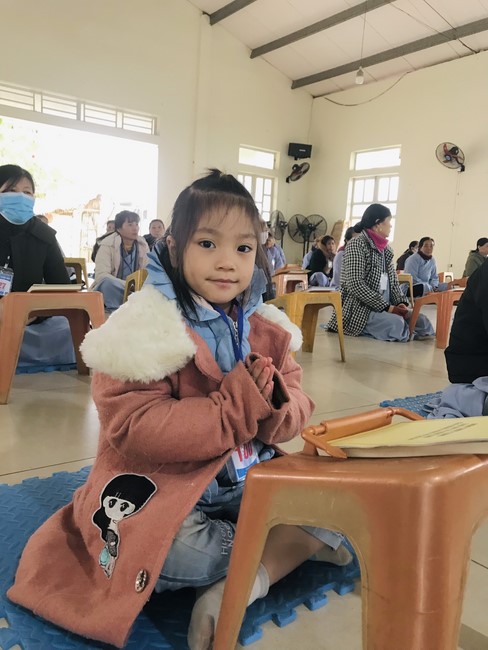Year End Practice, a past year closing program, giving Tet gifts at Dong Cao pagoda