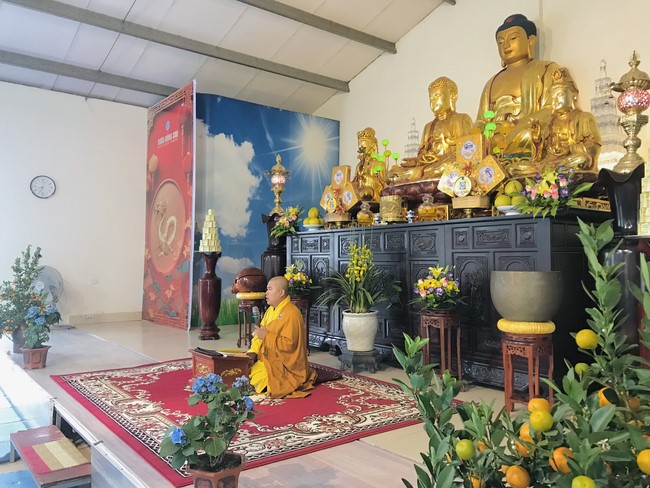 Year End Practice, a past year closing program, giving Tet gifts at Dong Cao pagoda