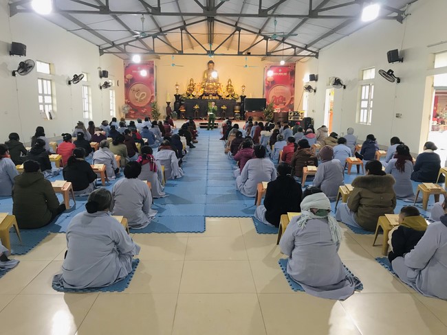 Year End Practice, a past year closing program, giving Tet gifts at Dong Cao pagoda