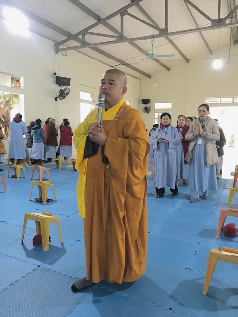 Year End Practice, a past year closing program, giving Tet gifts at Dong Cao pagoda