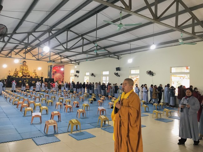 Year End Practice, a past year closing program, giving Tet gifts at Dong Cao pagoda