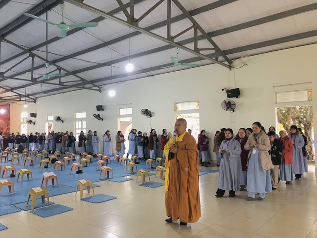 Year End Practice, a past year closing program, giving Tet gifts at Dong Cao pagoda