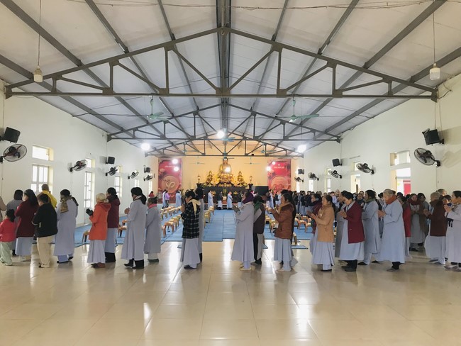 Year End Practice, a past year closing program, giving Tet gifts at Dong Cao pagoda