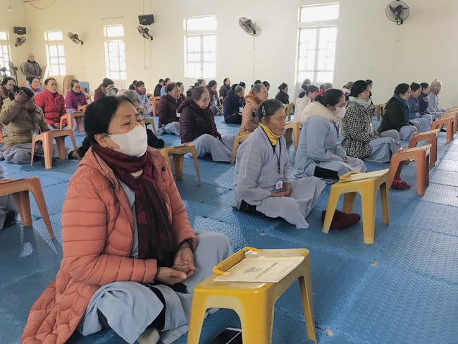 Year End Practice, a past year closing program, giving Tet gifts at Dong Cao pagoda