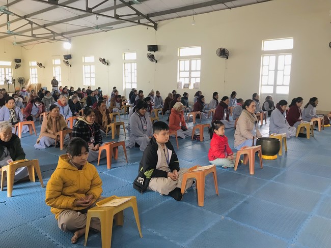 Year End Practice, a past year closing program, giving Tet gifts at Dong Cao pagoda
