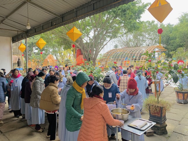 Year End Practice, a past year closing program, giving Tet gifts at Dong Cao pagoda