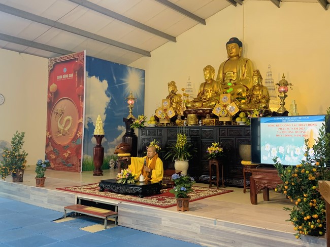 Year End Practice, a past year closing program, giving Tet gifts at Dong Cao pagoda