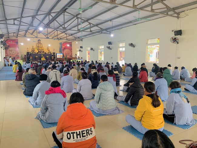Year End Practice, a past year closing program, giving Tet gifts at Dong Cao pagoda