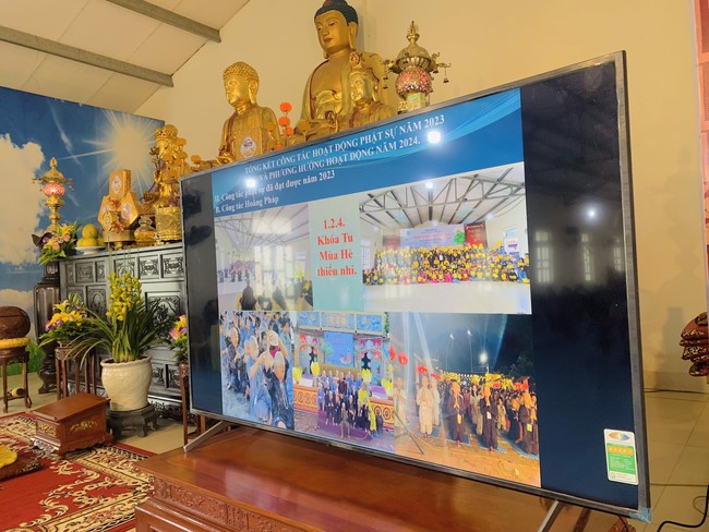 Year End Practice, a past year closing program, giving Tet gifts at Dong Cao pagoda