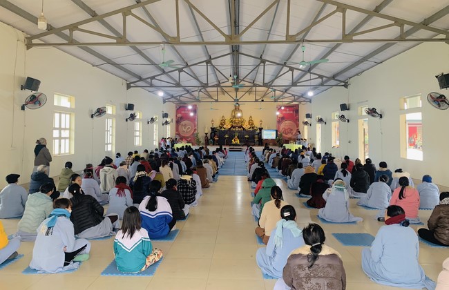 Year End Practice, a past year closing program, giving Tet gifts at Dong Cao pagoda