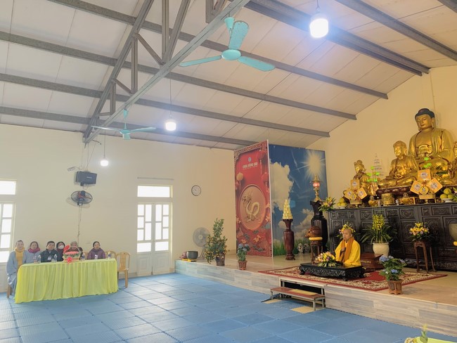 Year End Practice, a past year closing program, giving Tet gifts at Dong Cao pagoda