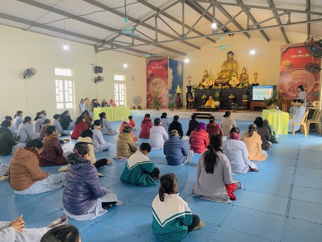 Year End Practice, a past year closing program, giving Tet gifts at Dong Cao pagoda