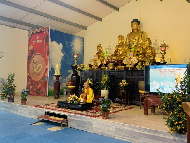 Year End Practice, a past year closing program, giving Tet gifts at Dong Cao pagoda