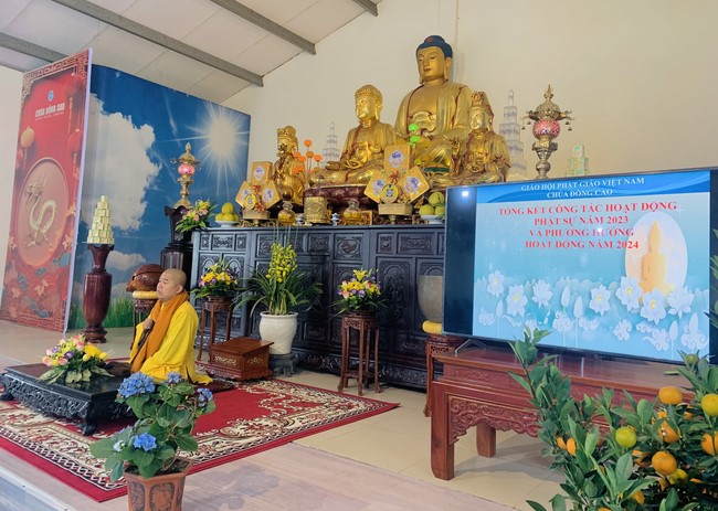 Year End Practice, a past year closing program, giving Tet gifts at Dong Cao pagoda