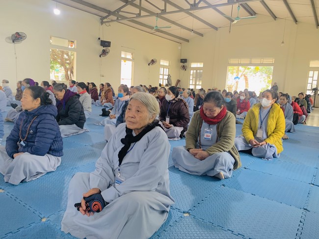 Year End Practice, a past year closing program, giving Tet gifts at Dong Cao pagoda