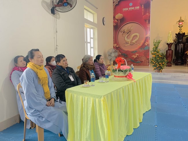 Year End Practice, a past year closing program, giving Tet gifts at Dong Cao pagoda