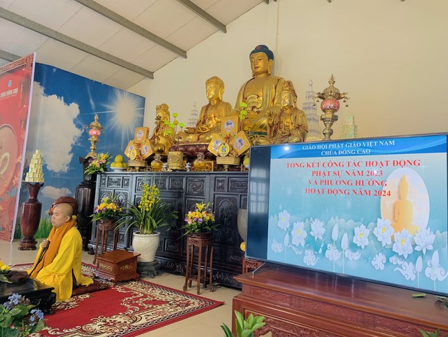 Year End Practice, a past year closing program, giving Tet gifts at Dong Cao pagoda