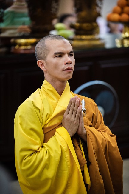 Nhan Van School students praying before the University Examination