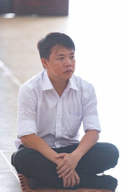 Nhan Van School students praying before the University Examination