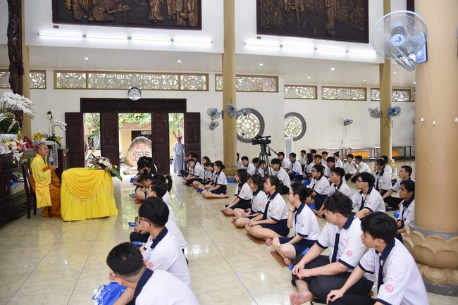 Nhan Van School students praying before the University Examination