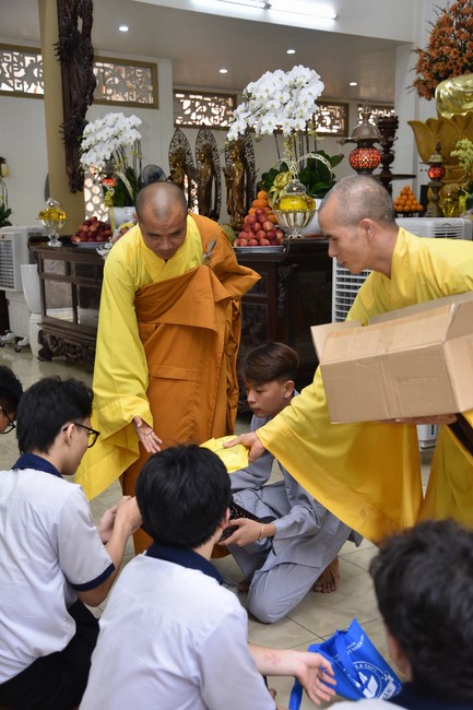 Nhan Van School students praying before the University Examination