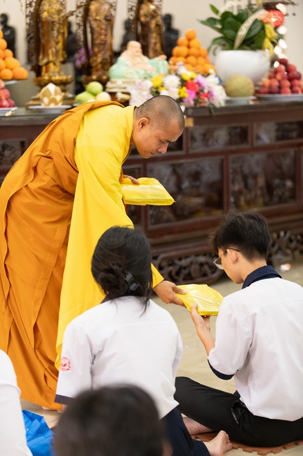Nhan Van School students praying before the University Examination