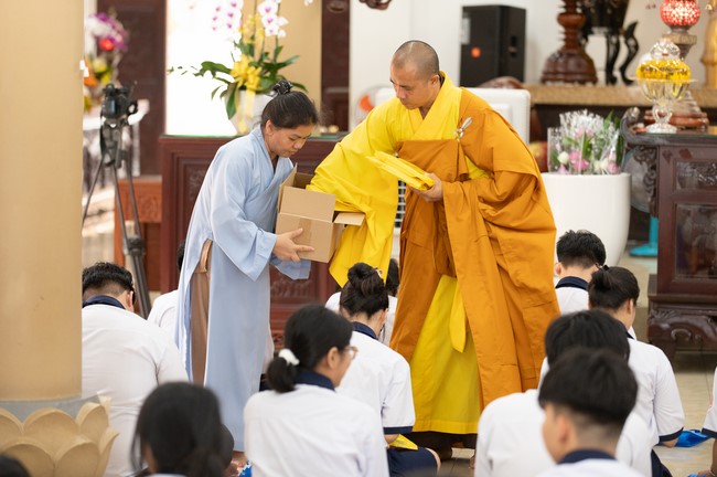 Nhan Van School students praying before the University Examination