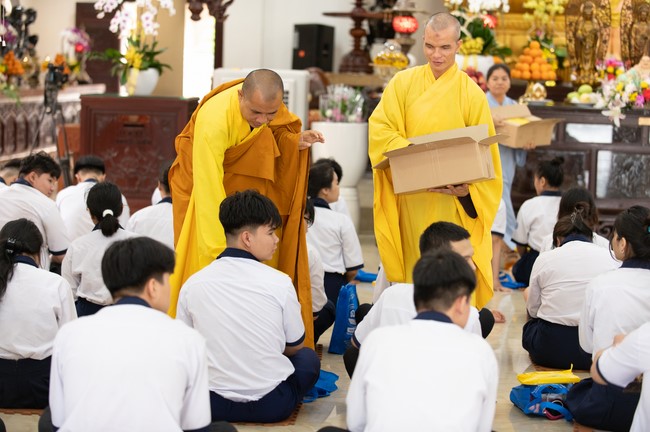 Nhan Van School students praying before the University Examination