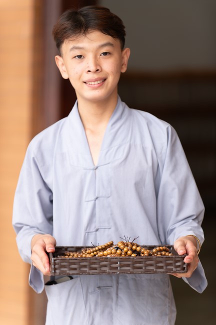 Nhan Van School students praying before the University Examination