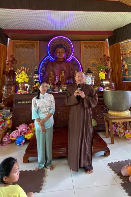 “Returning besides the Buddha on Mid-Autumn Festival for Kids of Suoi Phap Pagoda, Tay Ninh.