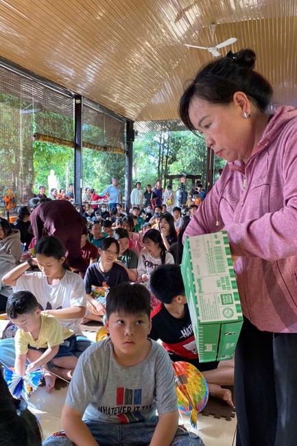 “Returning besides the Buddha on Mid-Autumn Festival for Kids of Suoi Phap Pagoda, Tay Ninh.
