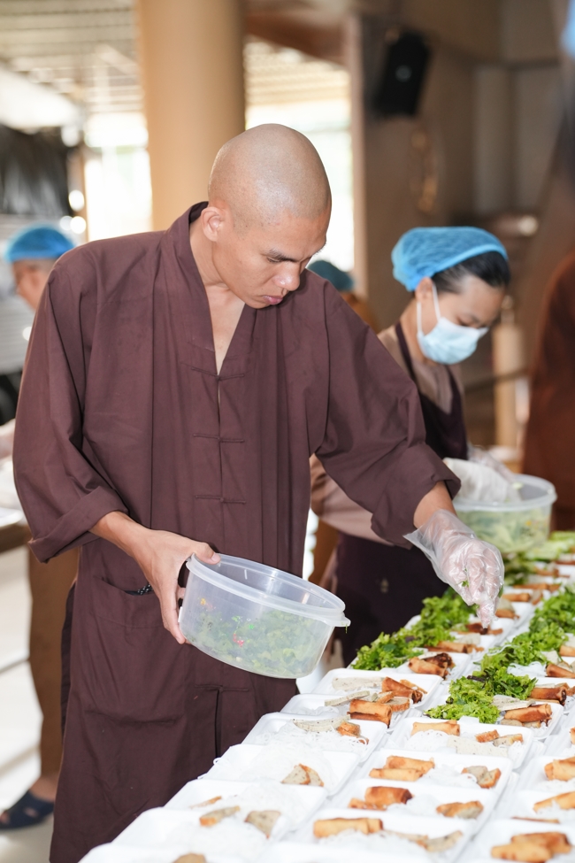 Giving vegetarian vermicelli at Thanh Loc  Paralytic Supporting and Nurturing Center in the Temple's Charity Activities