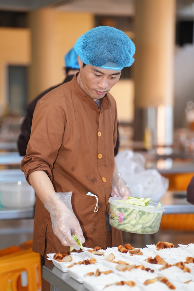 Giving vegetarian vermicelli at Thanh Loc  Paralytic Supporting and Nurturing Center in the Temple's Charity Activities