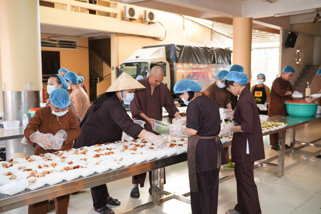 Giving vegetarian vermicelli at Thanh Loc  Paralytic Supporting and Nurturing Center in the Temple's Charity Activities