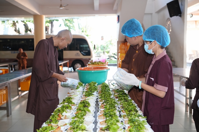Giving vegetarian vermicelli at Thanh Loc  Paralytic Supporting and Nurturing Center in the Temple's Charity Activities