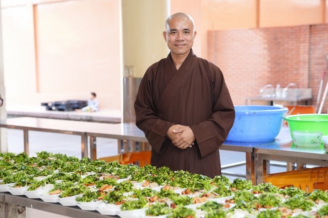 Giving vegetarian vermicelli at Thanh Loc  Paralytic Supporting and Nurturing Center in the Temple's Charity Activities