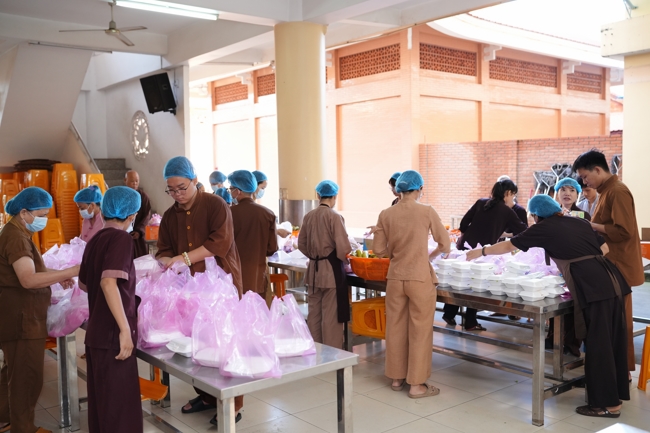 Giving vegetarian vermicelli at Thanh Loc  Paralytic Supporting and Nurturing Center in the Temple's Charity Activities