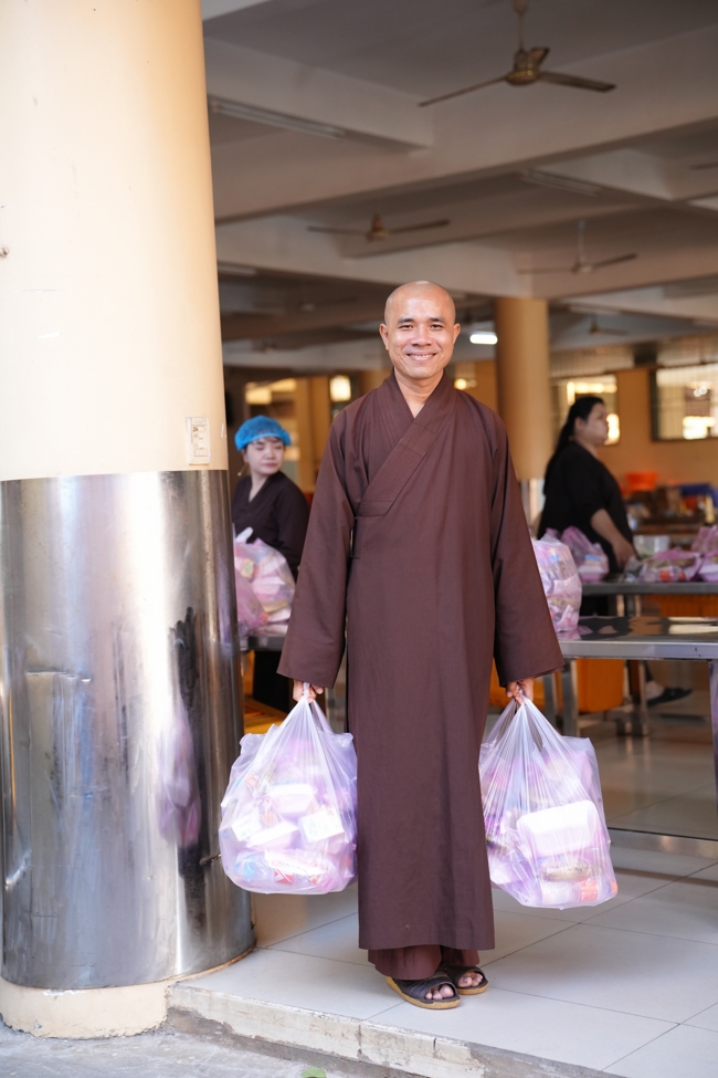Giving vegetarian vermicelli at Thanh Loc  Paralytic Supporting and Nurturing Center in the Temple's Charity Activities