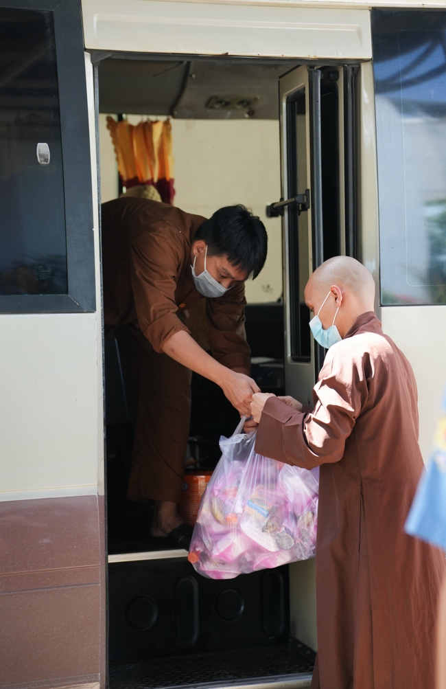 Giving vegetarian vermicelli at Thanh Loc  Paralytic Supporting and Nurturing Center in the Temple's Charity Activities