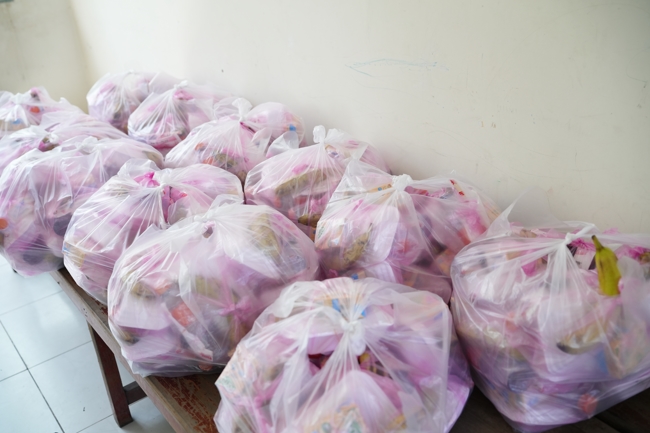 Giving vegetarian vermicelli at Thanh Loc  Paralytic Supporting and Nurturing Center in the Temple's Charity Activities