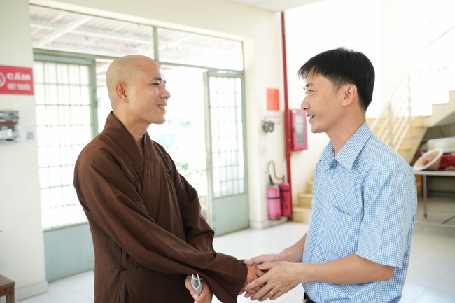 Giving vegetarian vermicelli at Thanh Loc  Paralytic Supporting and Nurturing Center in the Temple's Charity Activities