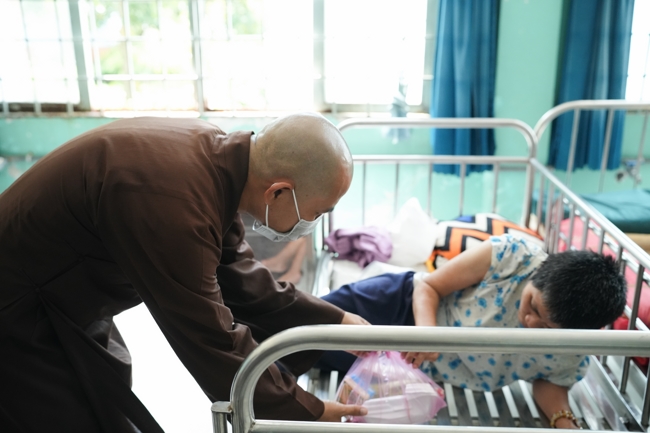 Giving vegetarian vermicelli at Thanh Loc  Paralytic Supporting and Nurturing Center in the Temple's Charity Activities