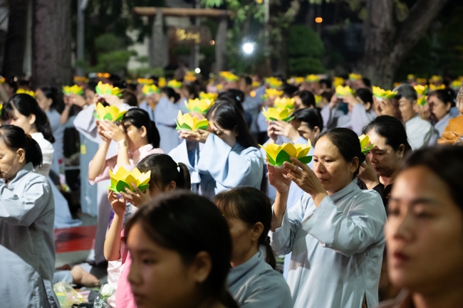 Candle Lighting Night of Ullambana Ceremony holding by Hieu and Thuong Group