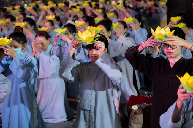 Candle Lighting Night of Ullambana Ceremony holding by Hieu and Thuong Group